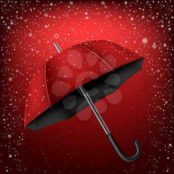 Red and black umbrella on snow background. Christmas and New Year theme