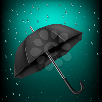 The opened black umbrella on rainy azure background