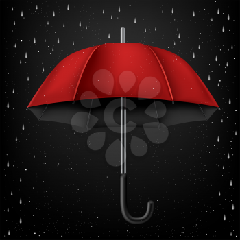 The opened red umbrella on rainy dark background