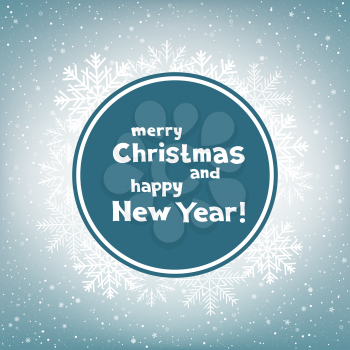 The colored blue circle paper with the message of Christmas greetings on light snow background