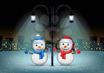 Snowmans standing in pillar lamps lights. Christmas snowflakes falls on night city background