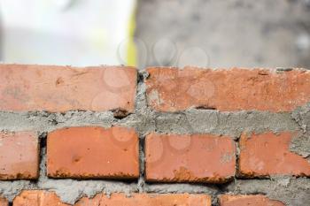 Fresh brickwork makes a wall.