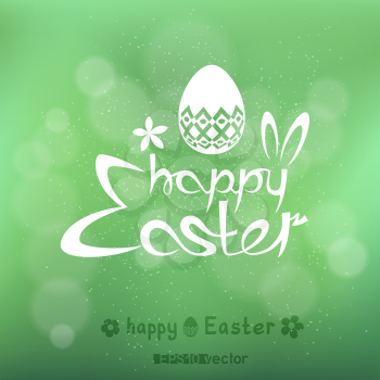 Happy Easter text on green blurry bokeh background. Nature spring holiday eggs with a pattern, rabbit ears and white message natural backdrop