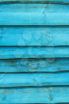 Blue wooden boards vertical background. Wall floor or fence exterior design. Natural wood material backdrop