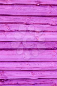 Pink wooden boards vertical background. Wall floor or fence exterior design. Natural wood material backdrop