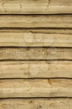 Wooden brown boards vertical background. Wall floor or fence exterior design. Natural wood material backdrop