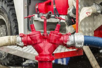 Fire truck equipment. Hoses supply connected to hydrant