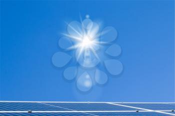 Solar panels sun and blue sky backdrop Sunlight clean energy power. Renewable green cheap electricity