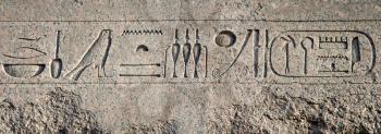 Granite wall with an Egyptian hieroglyphs