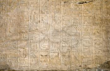 Stone wall with an Egyptian hieroglyphs