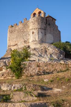 Medieval stone castle on the rock in Calafell town, Spain