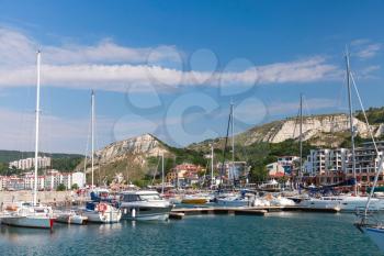 Yachts and pleasure boats are moored in marina of Balchik, Bulgaria