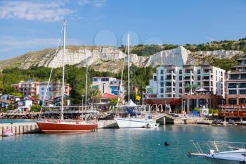 Yachts and pleasure motor boats are moored in bay of Balchik, Bulgaria