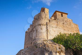 Medieval stone castle on the rock in Spain. Main landmark of Calafell