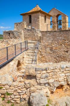 Medieval stone castle in ancient Calafell town, Spain, vertical photo