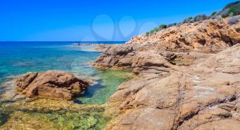 Coastal landscape of Plage De Capo Di Feno. Empty rocky wild beach, South Corsica, France