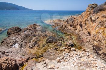 Coastal landscape with rocks and sea water, South Corsica, France. Plage De Capo Di Feno