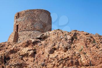 Ancient Genoese tower on Capo Rosso, Piana region, Corsica island, France