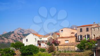 Rural Corsican landscape, with small living houses. Piana, South Corsica, France