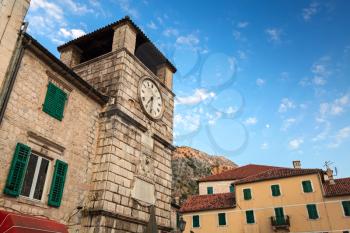 Old tower with clock in Kotor town, Montenegro