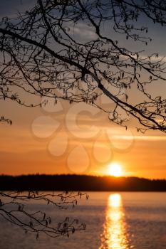 Bright sunset on the Saimaa lake in Finland