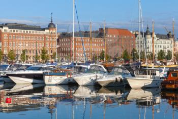 Yachts and pleasure motor boats moored in central marina of Helsinki, Finland