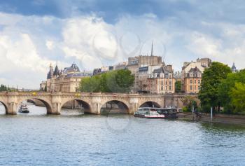 Cite Island and Pont Neuf, the oldest stone bridge across Seine river in Paris, France