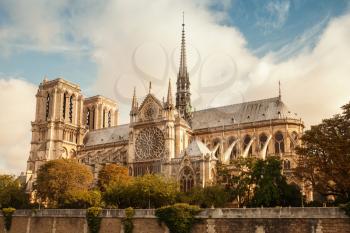 Notre Dame de Paris cathedral. The most popular city landmark. Vintage toned retro stylized photo filter
