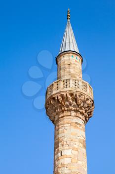 Minaret of ancient Camii mosque. Central Konak square, Izmir, Turkey