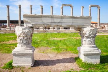 White portico fragment and columns on a background, ruins of Ancient city Smyrna. Izmir, Turkey