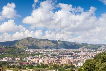 Naples cityscape with modern city part and Stadio San Paolo stadium under blue cloudy sky