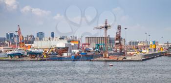 Port of Naples, coastal cityscape with shipyard dock