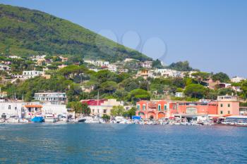 Coastal summer landscape, main port of Ischia island. Mediterranean sea, Bay of Naples, Italy