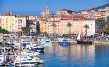 Ajaccio port cityscape with moored yachts and pleasure boats , Corsica island, France