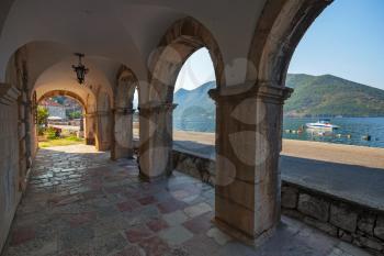 Dark archway in the old house in Perast town, Montenegro