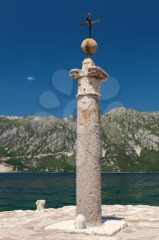 Cross on the island of Lady of the Rocks. Bay of Kotor, Montenegro
