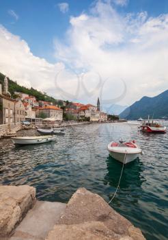 Bay of Kotor, Montenegro. Small boats moored in Perast town