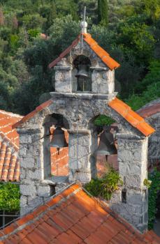 Small bell tower of the Orthodox Church. The monastery Gradiste, Montenegro
