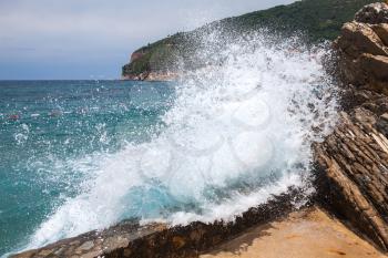 Breaking wave on Adriatic Sea coast in Montenegro