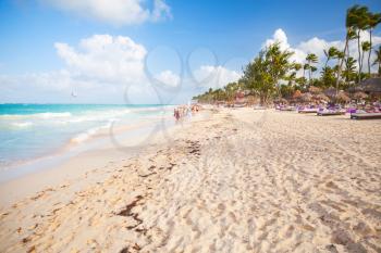 Empty sandy beach landscape. Atlantic ocean coast, Dominican republic. Punta Cana