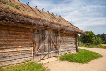 Russian rural wooden architecture example, old barn with locked gate