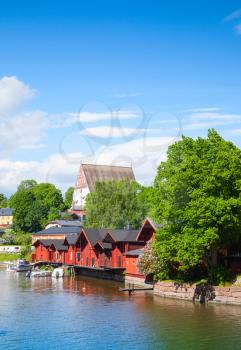 Porvoo. Small historical town in Finland. Old red wooden houses and trees on the coast