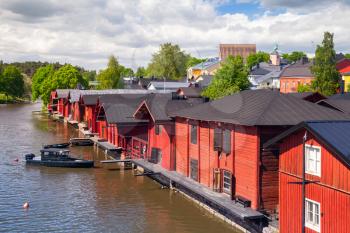 Old red wooden houses on the coast, Porvoo small historical town in Finland