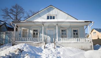 Rural wooden house with snowdrifts. Suomenlinna island, Helsinki, Finland