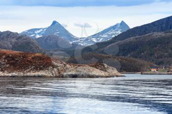 Spring Norwegian landscape with sea and mountains