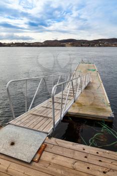 Small floating pier with ladder in Norway