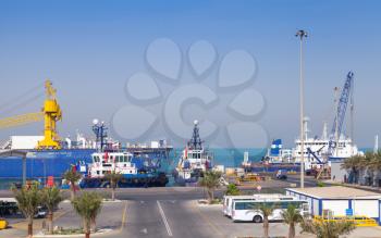 RAS TANURA, SAUDI ARABIA - MAY 21, 2014: Port view with moored ships, Saudi Arabia