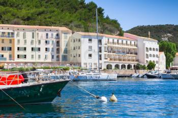 Bonifacio port view, small resort port city of Corsica island in sunny summer day, Corse-du-Sud, France