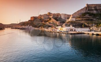 Bonifacio port in morning sunlight, mountainous Mediterranean island Corsica, Corse-du-Sud, France