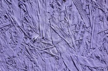 Purple painted oriented strand board also known as OSB. Sterling board background photo texture